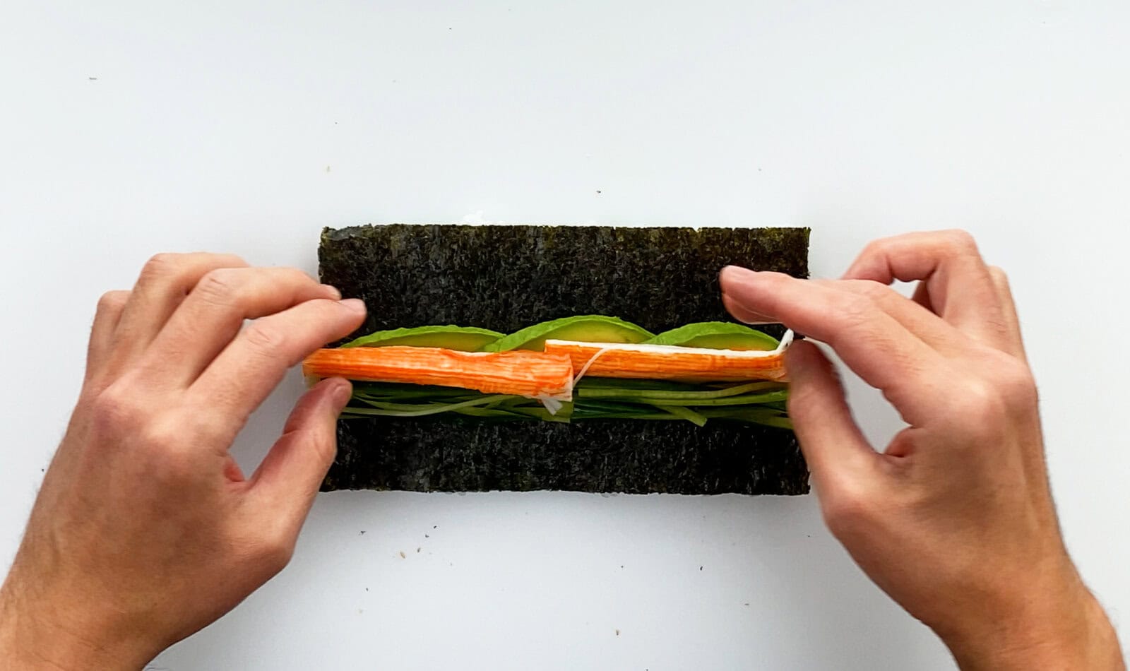 Fillings on top of nori sheet for sushi