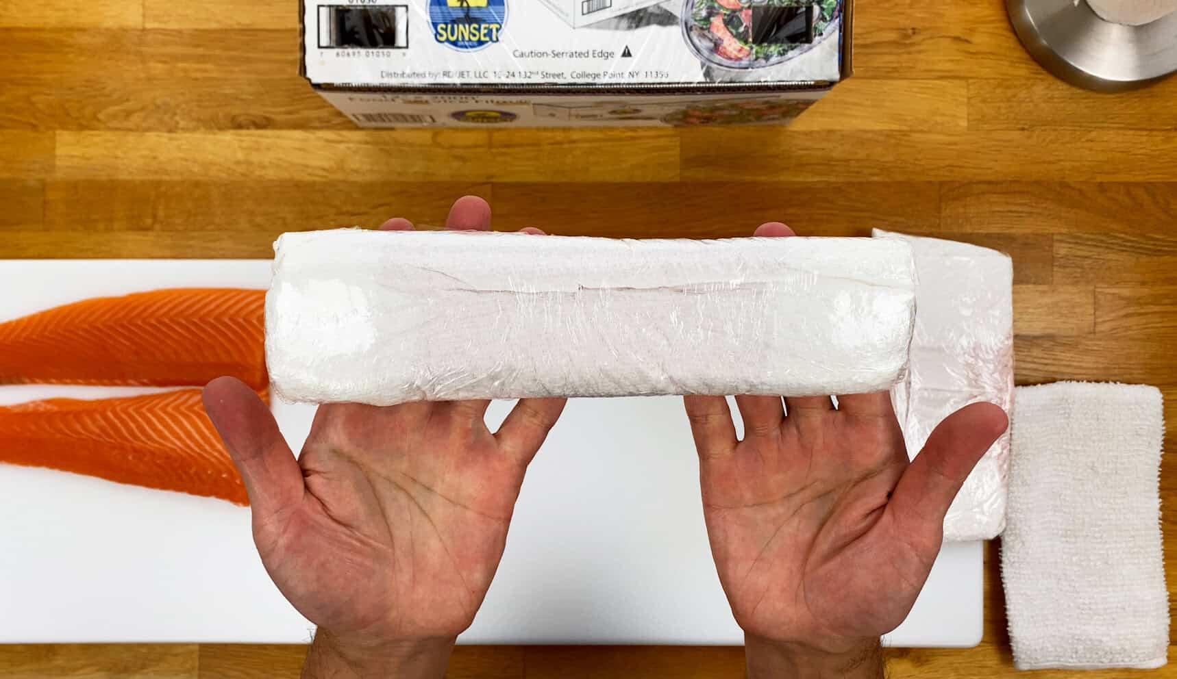 Costco salmon wrapped in paper towel and plastic