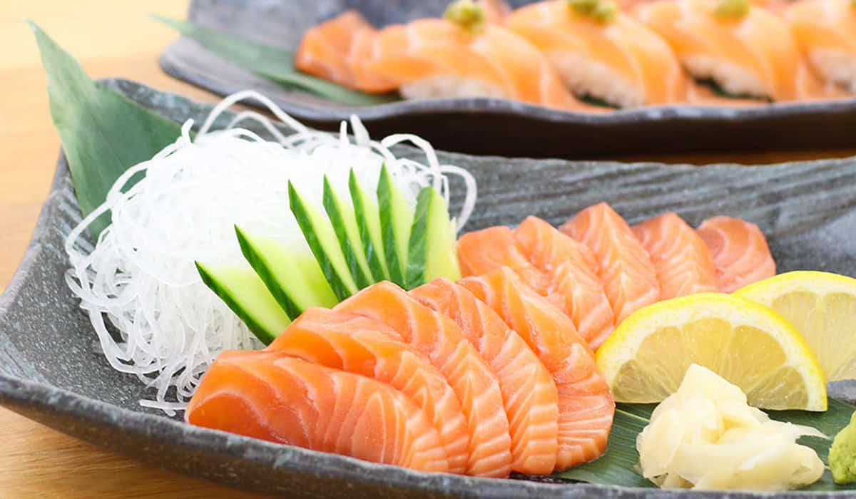 Salmon sashimi and sushi close up