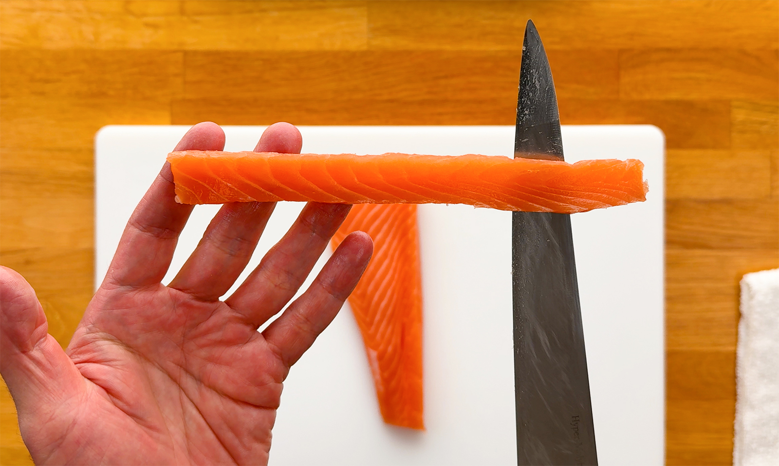 Salmon strip cut to size for sushi rolls